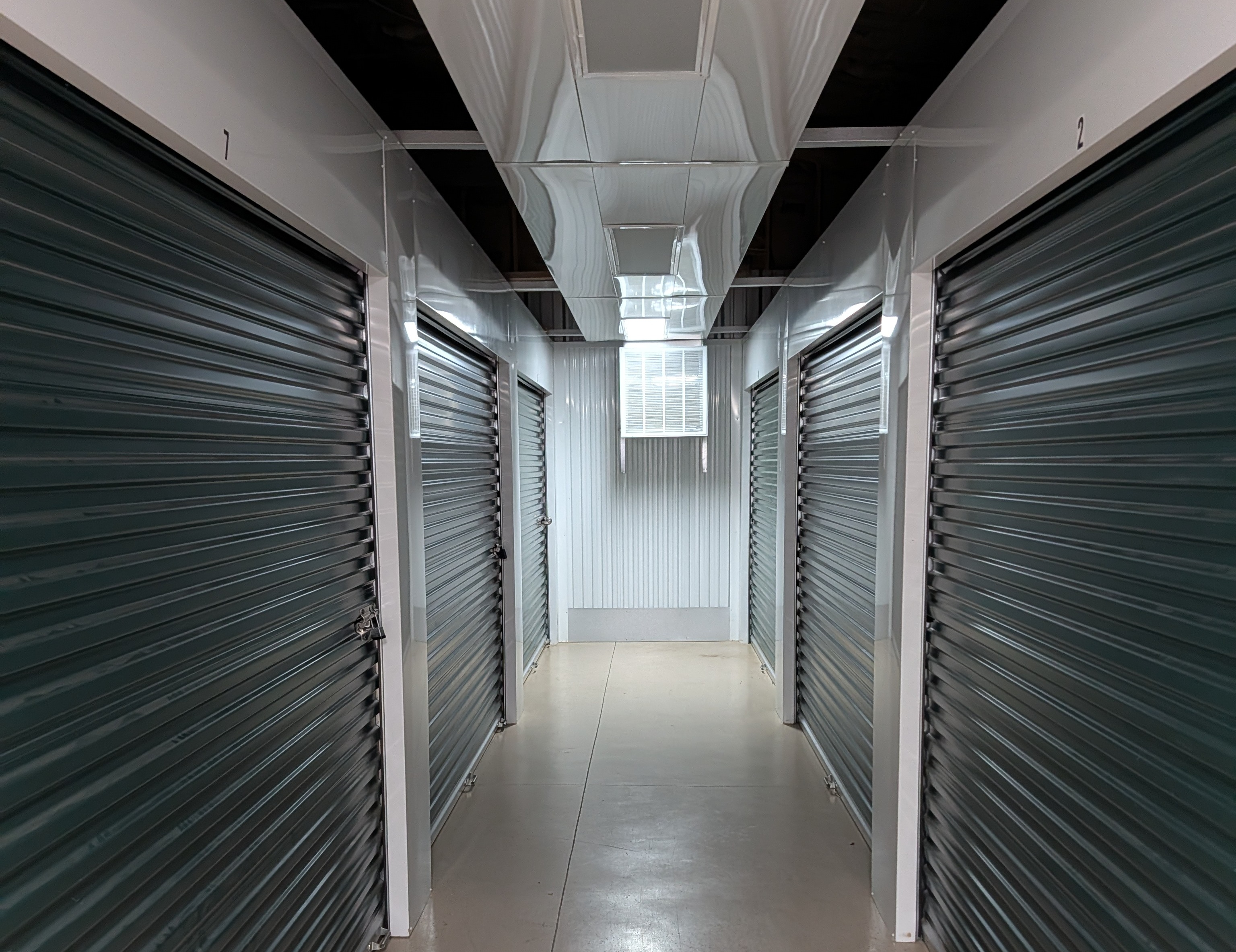 Interior hallway of climate-controlled storage units at Eagle Guard Storage in Marble Hill, Georgia.